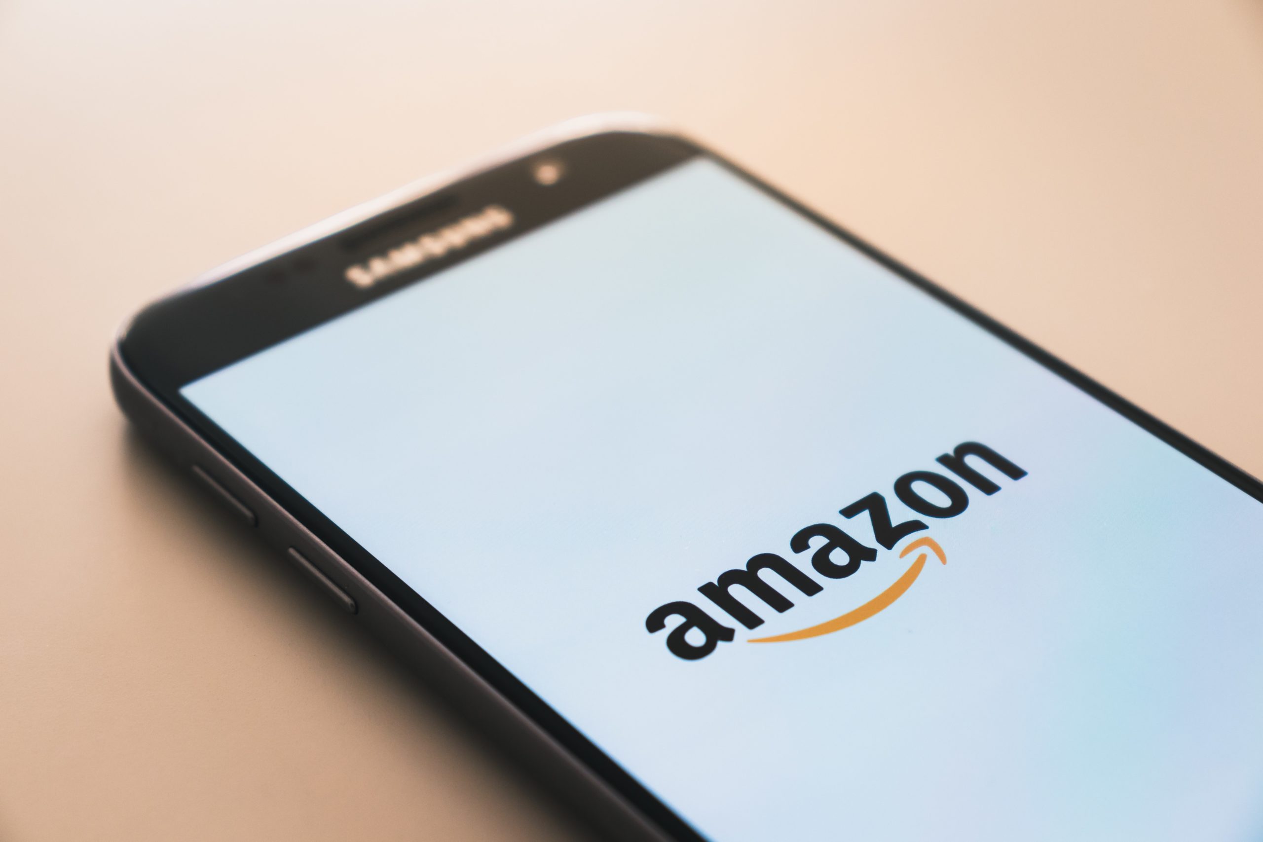 Amazon logo. Image credit: Christian Wiediger on Unsplash